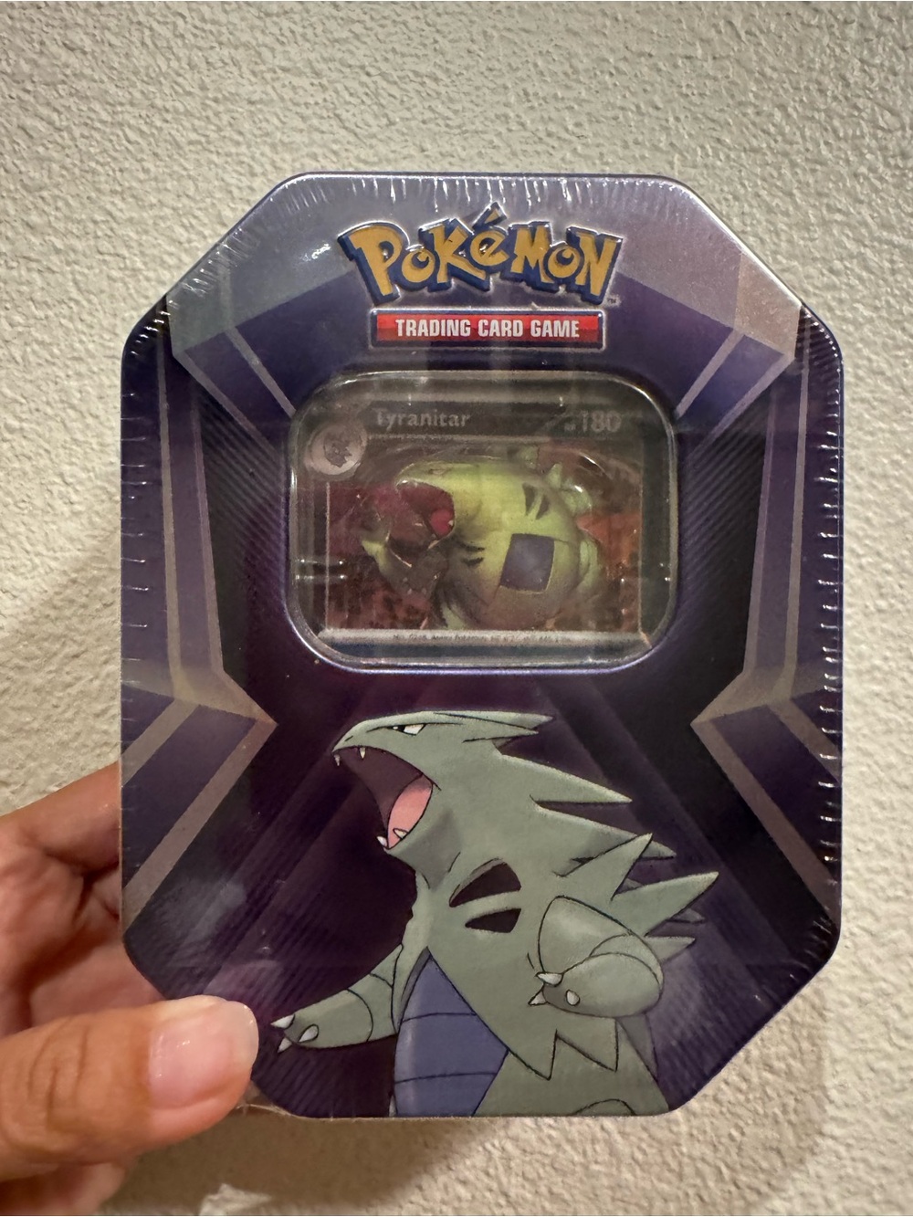 Pokemon Tin with Purple and Green Tyranitar Artwork